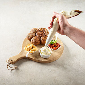 Cooking with cream cheese piping bag